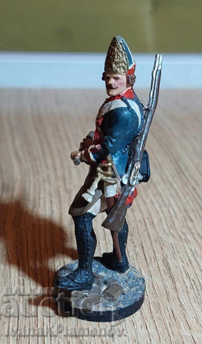 Auction  A lead figurine for collectors