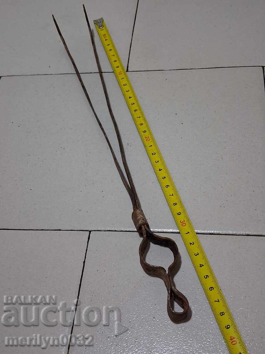 Auction  Old tongs, dilaf, wrought iron