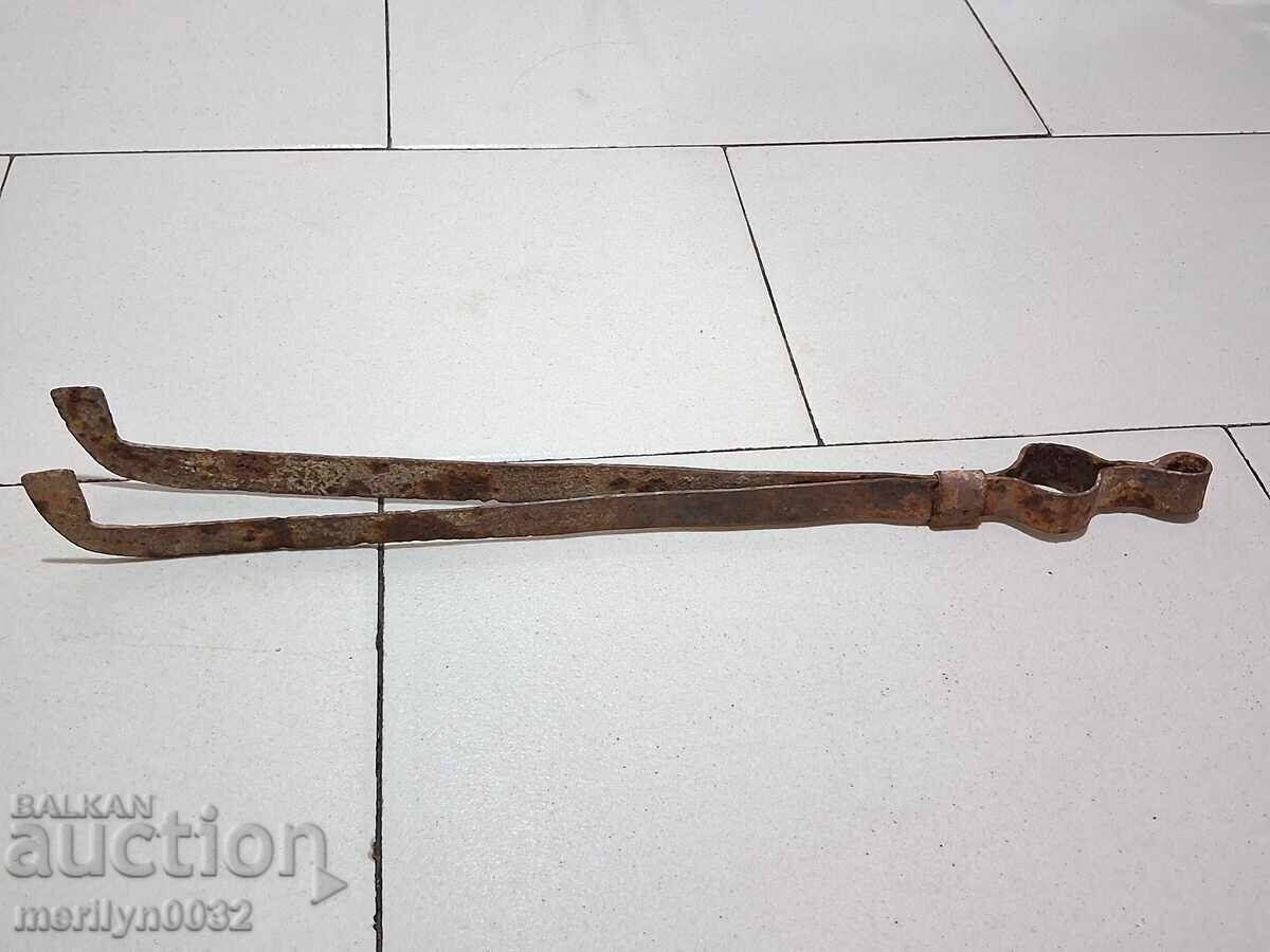 Delivery of Old tongs, dilaf, wrought iron