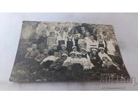 Fotografie Elevi din clasa a IV-a cu învățătorul lor