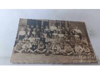 Photo of Students with their Teacher