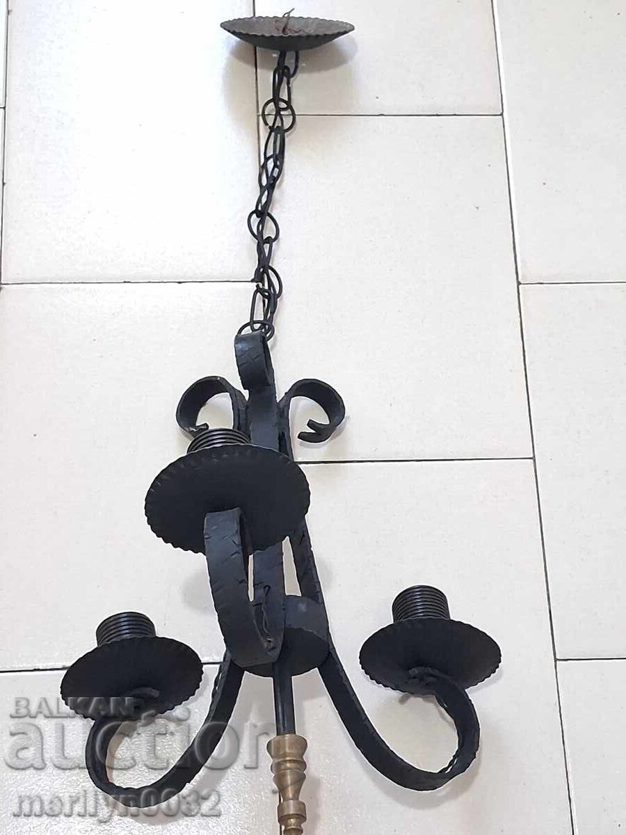 Old wrought iron engraved chandelier lamp without lampshade