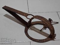 Old hand forged trap, wrought iron