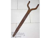 Old hand-forged farrier's tool, wrought iron