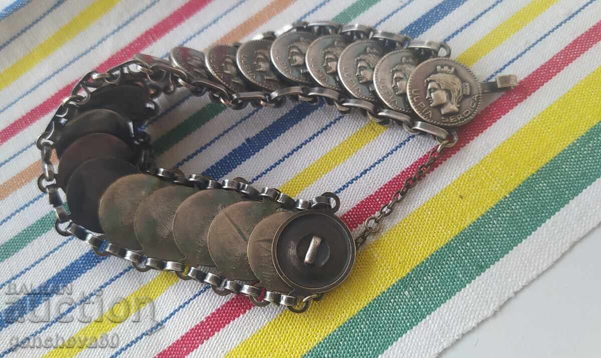 Auction  Antique costume jewelry bracelet with UIPIA CERDICA coins