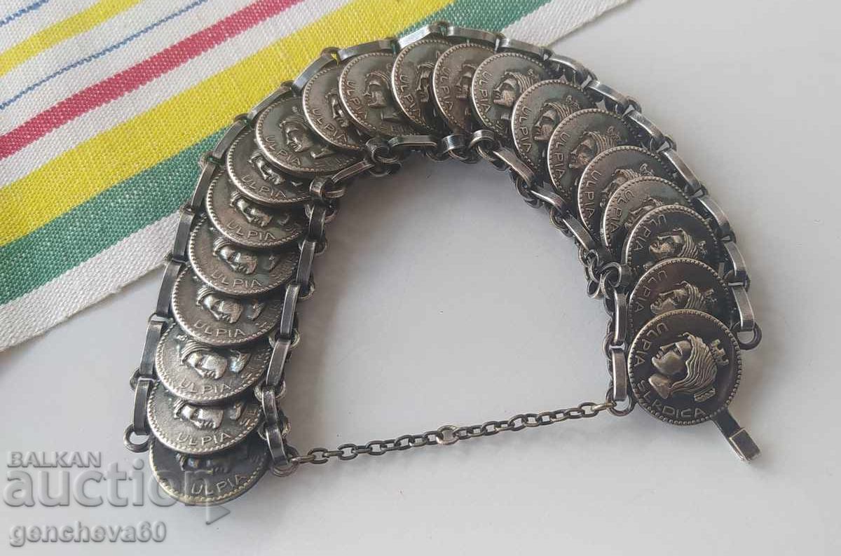 Antique costume jewelry bracelet with UIPIA CERDICA coins