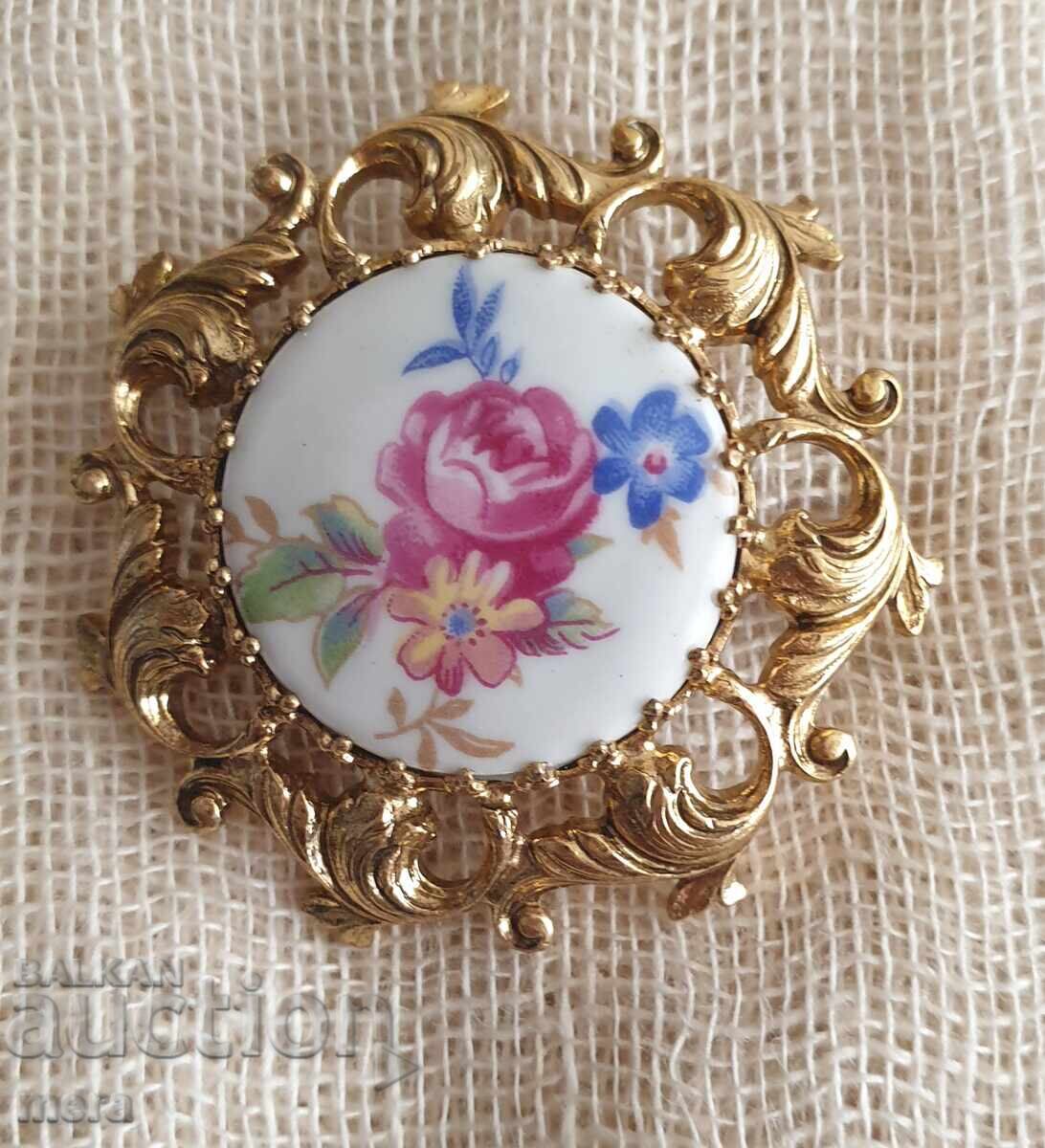 Porcelain brooch with rhinestones