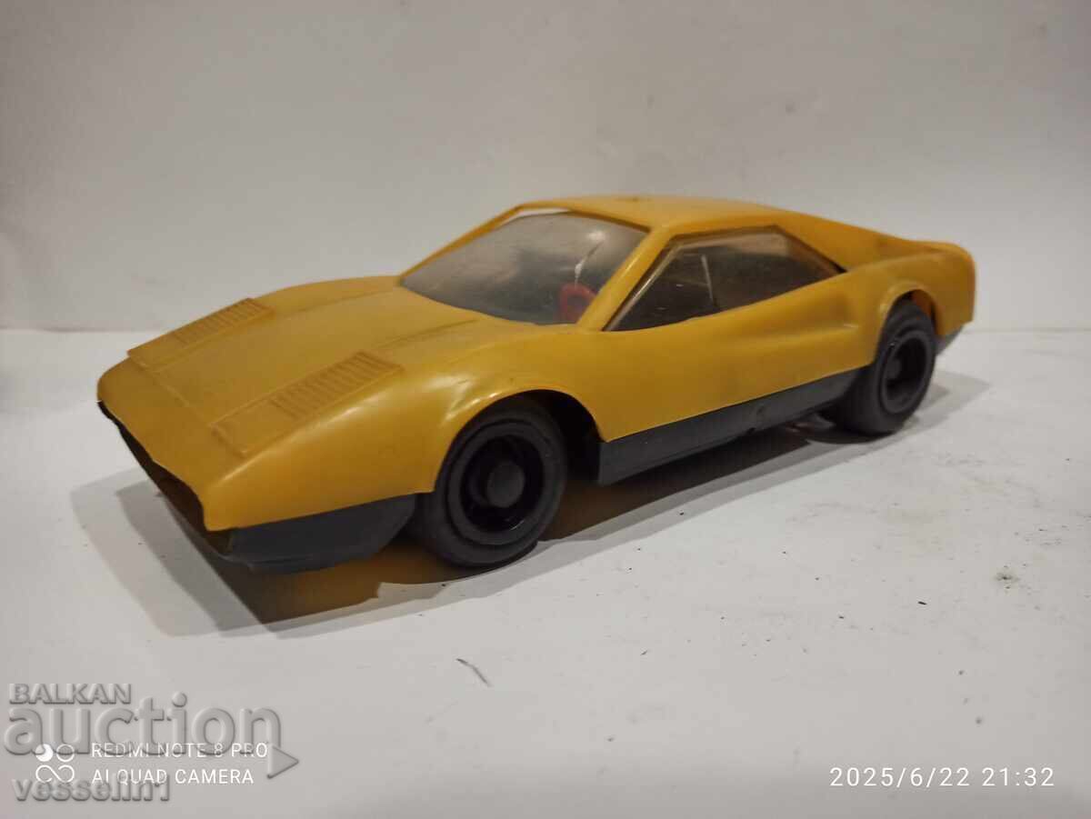 Old Bulgarian plastic car with friction mechanism, social (era)