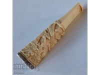 Цигаре от слонова кост и сребро.