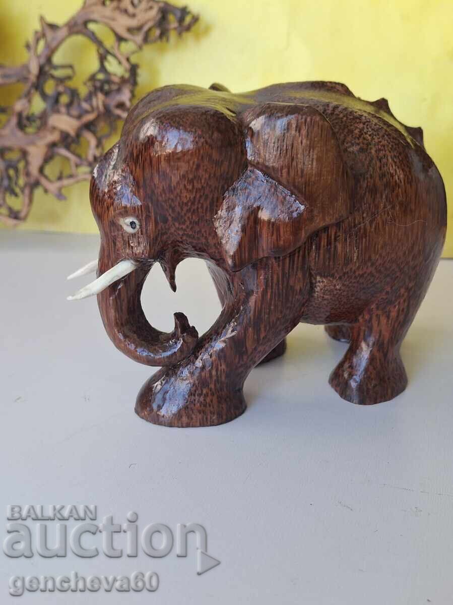 Delivery of Hand-carved wooden elephant figure
