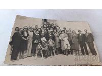 Photos: Men, Women, Children, and Spiritual Figure