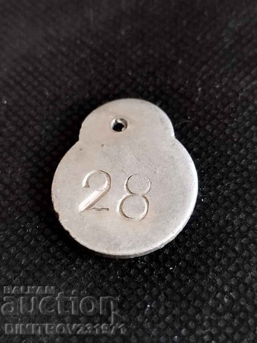 Badge. Token 28 Badge. Token 28