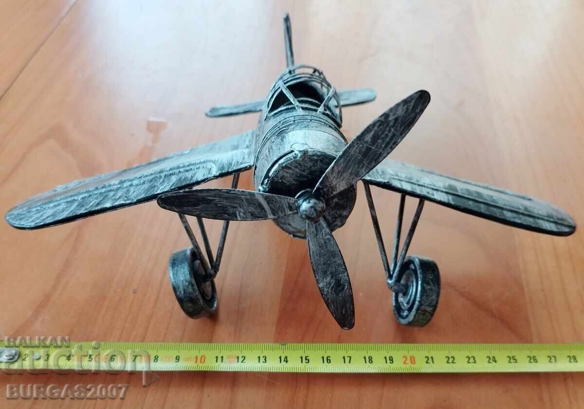 Delivery of Old tin toy, airplane