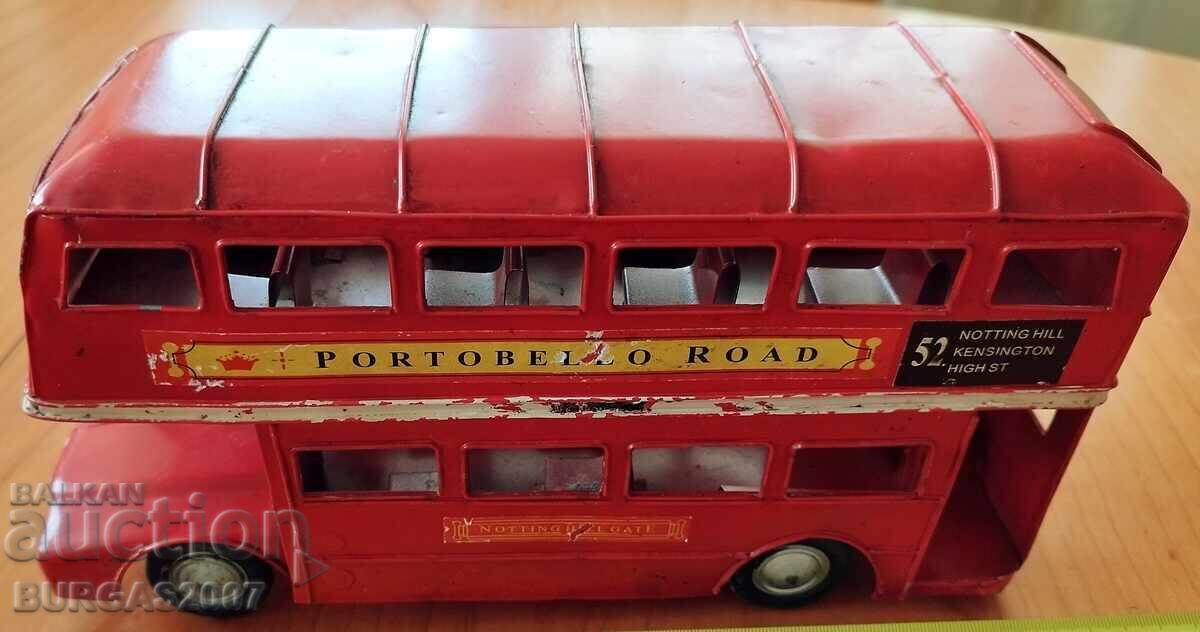 Old tin toy, double-decker bus Old tin toy, double-decker bus