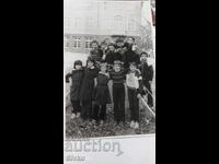 Photo of students in the schoolyard, 70s