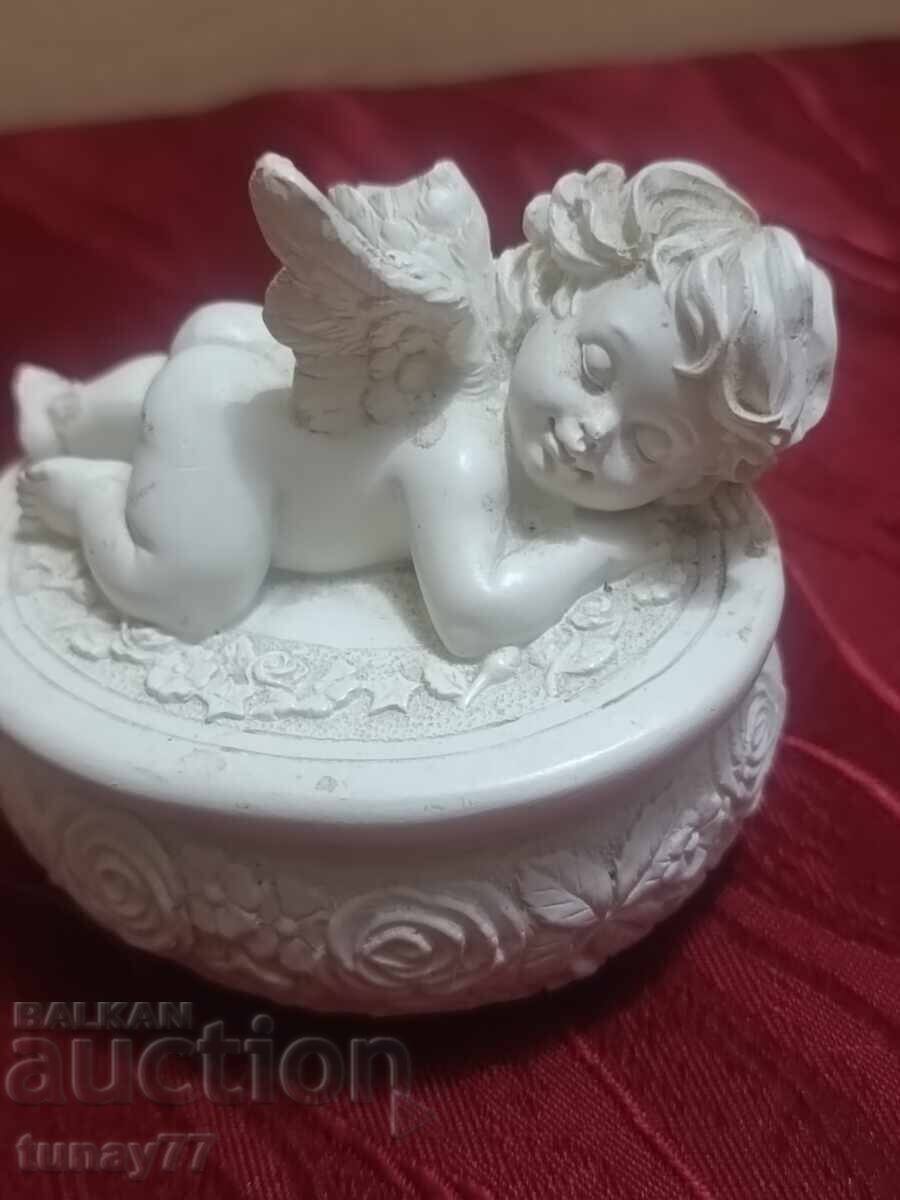 Jewelry seated angel with a small bouquet in raised right hand with price € 5.00 | 9.78 BGN