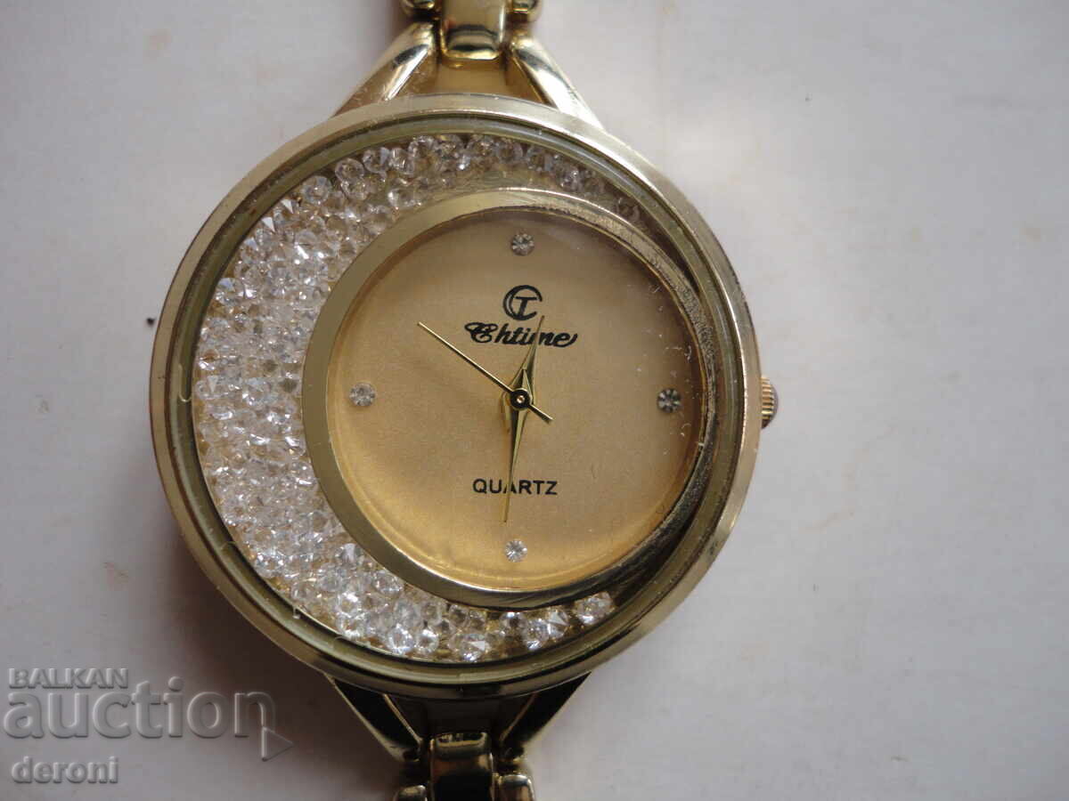 Auction  Gold-plated watch with crystals