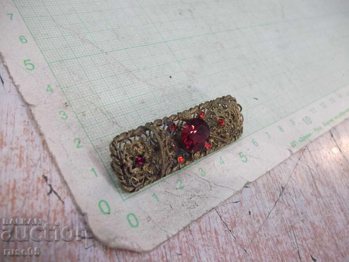 Filigree brooch, old metal, with red stones with price 20.00 BGN | € 10.23