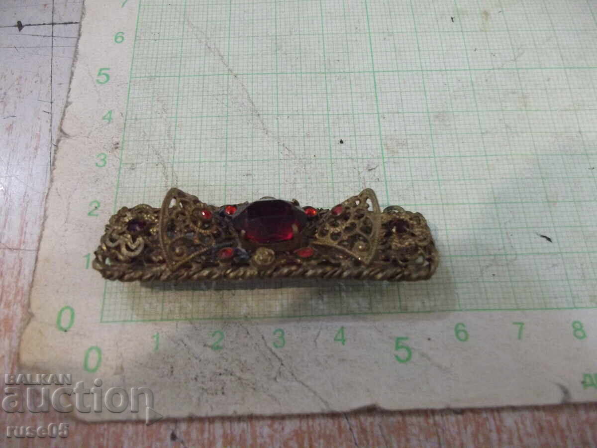Auction  Filigree brooch, old metal, with red stones