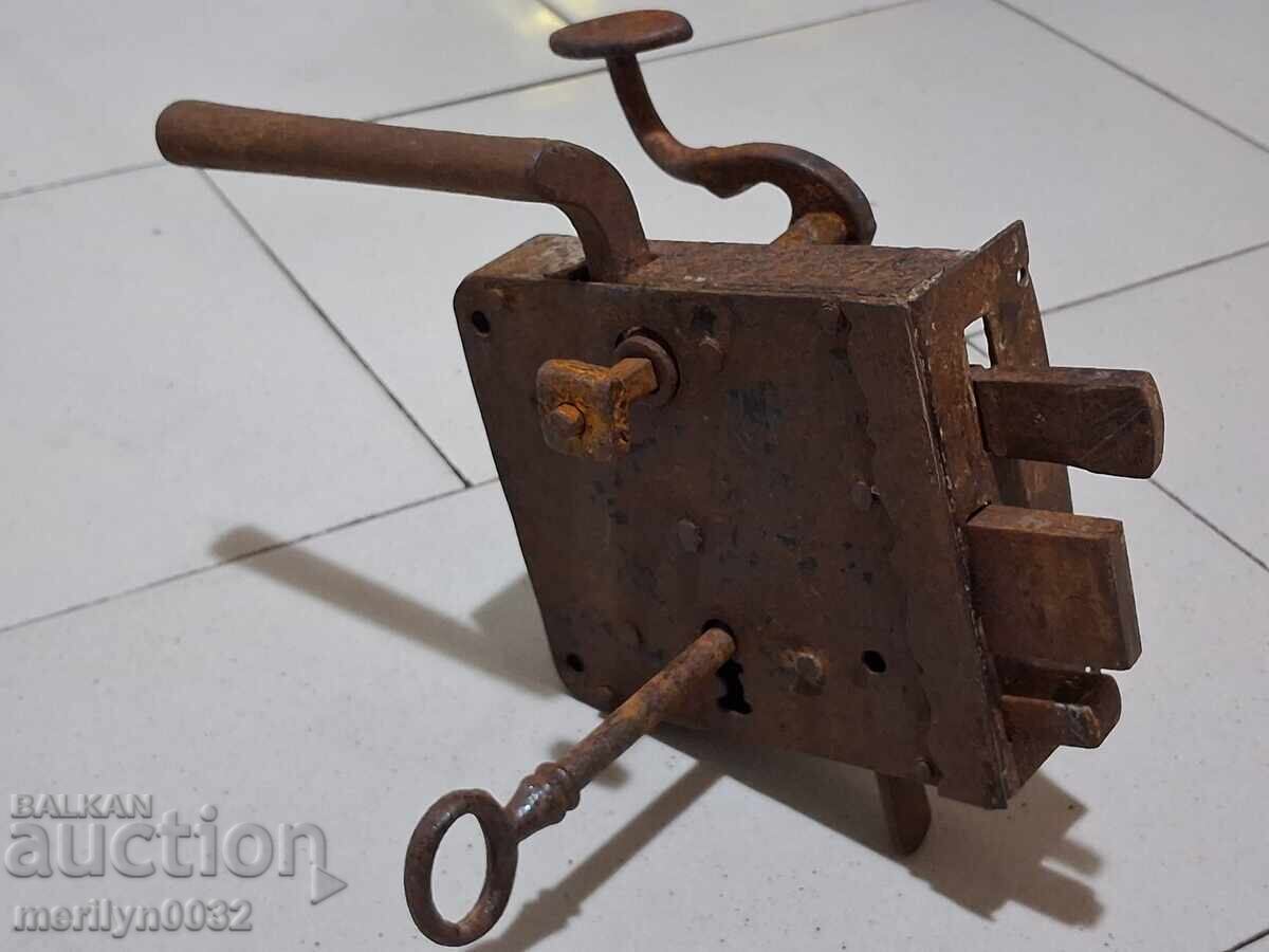Old lock with key, latch late 19th century Old lock with key, latch late 19th century
