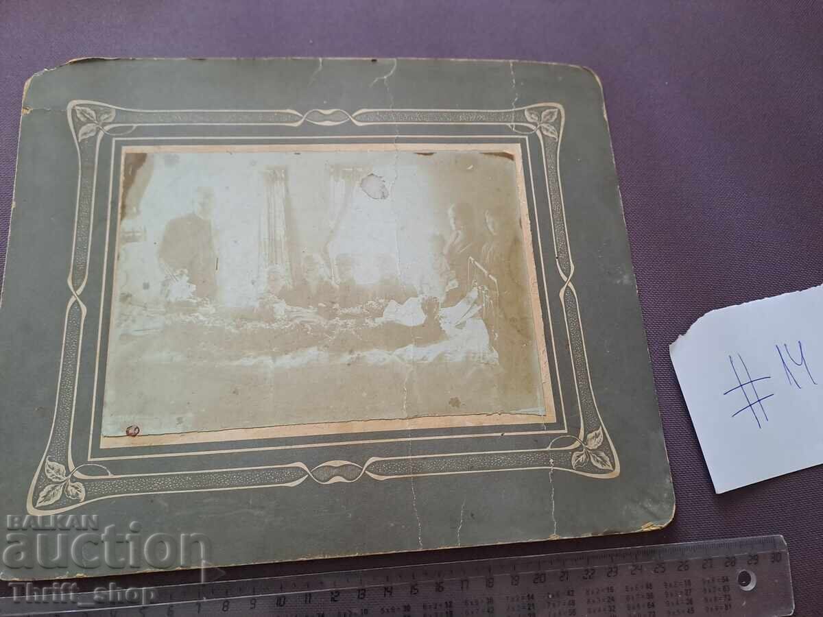 Old photo - cardboard - person on a bed? Old photo - cardboard - person on a bed?