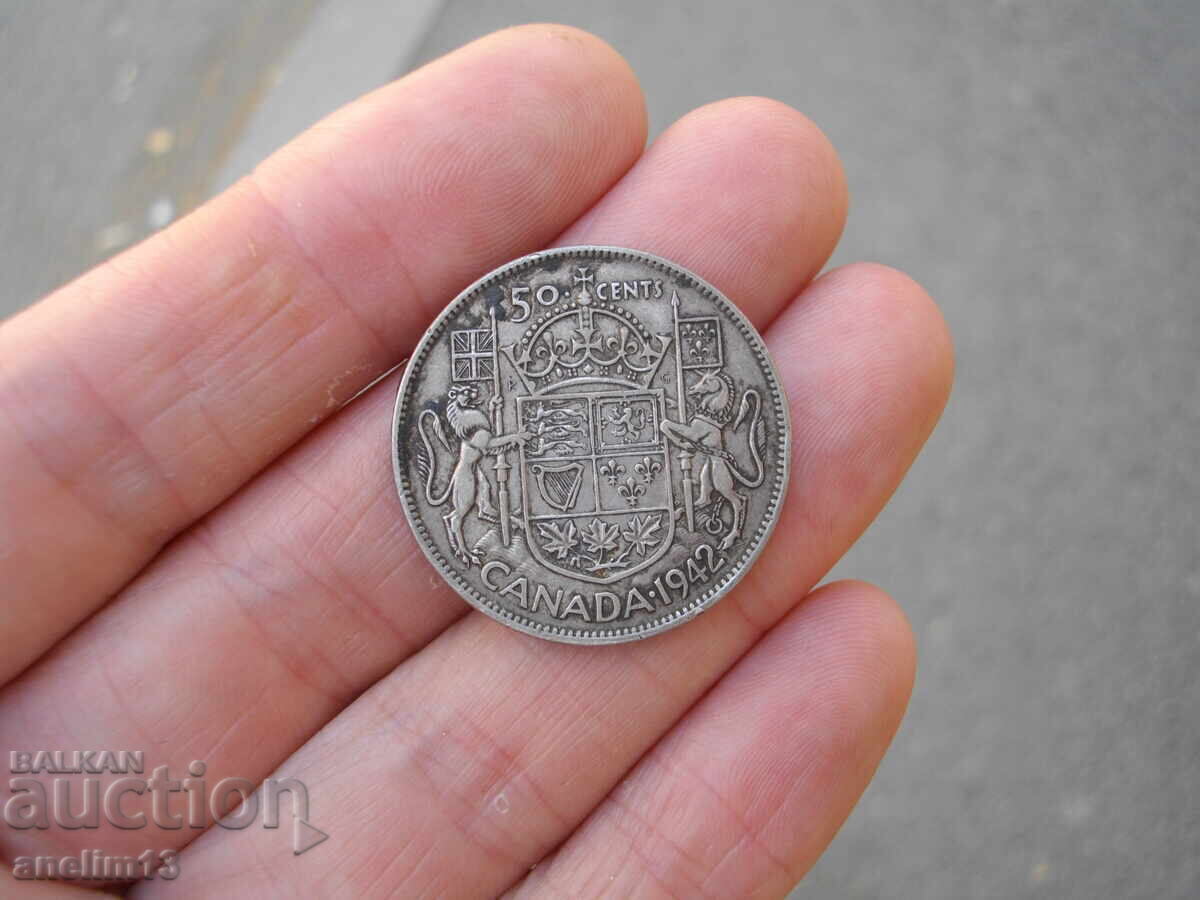 Auction  50 CENTS 1942 CANADA SILVER