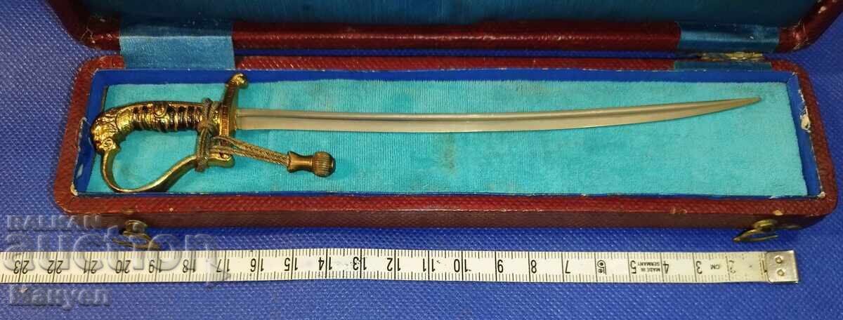 Auction  Officer's saber, miniature, lion's head