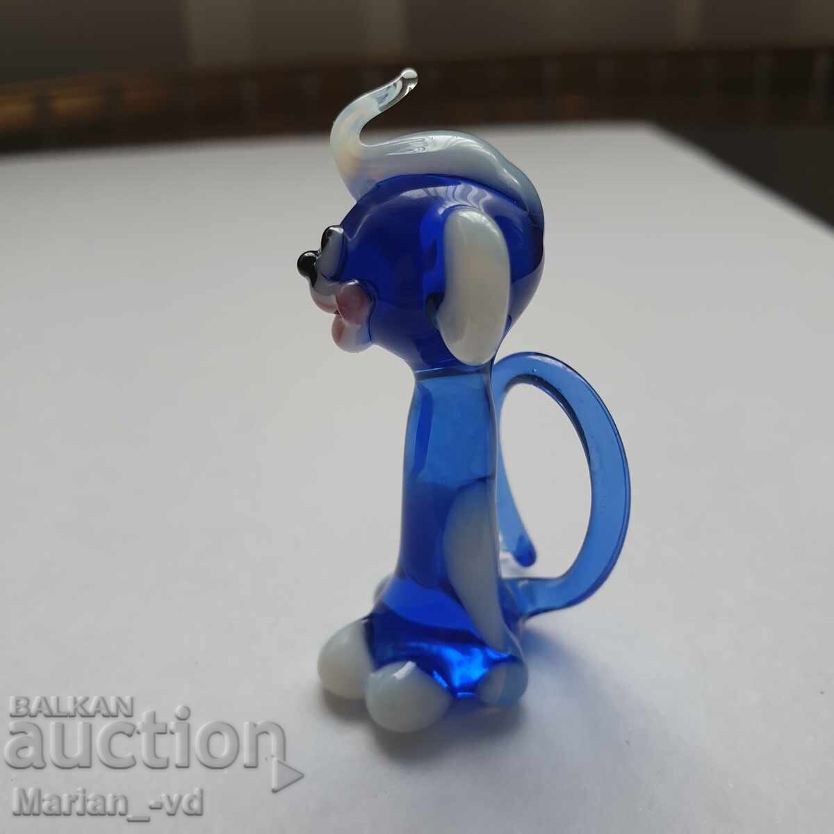 Delivery of Blue glass monkey statue
