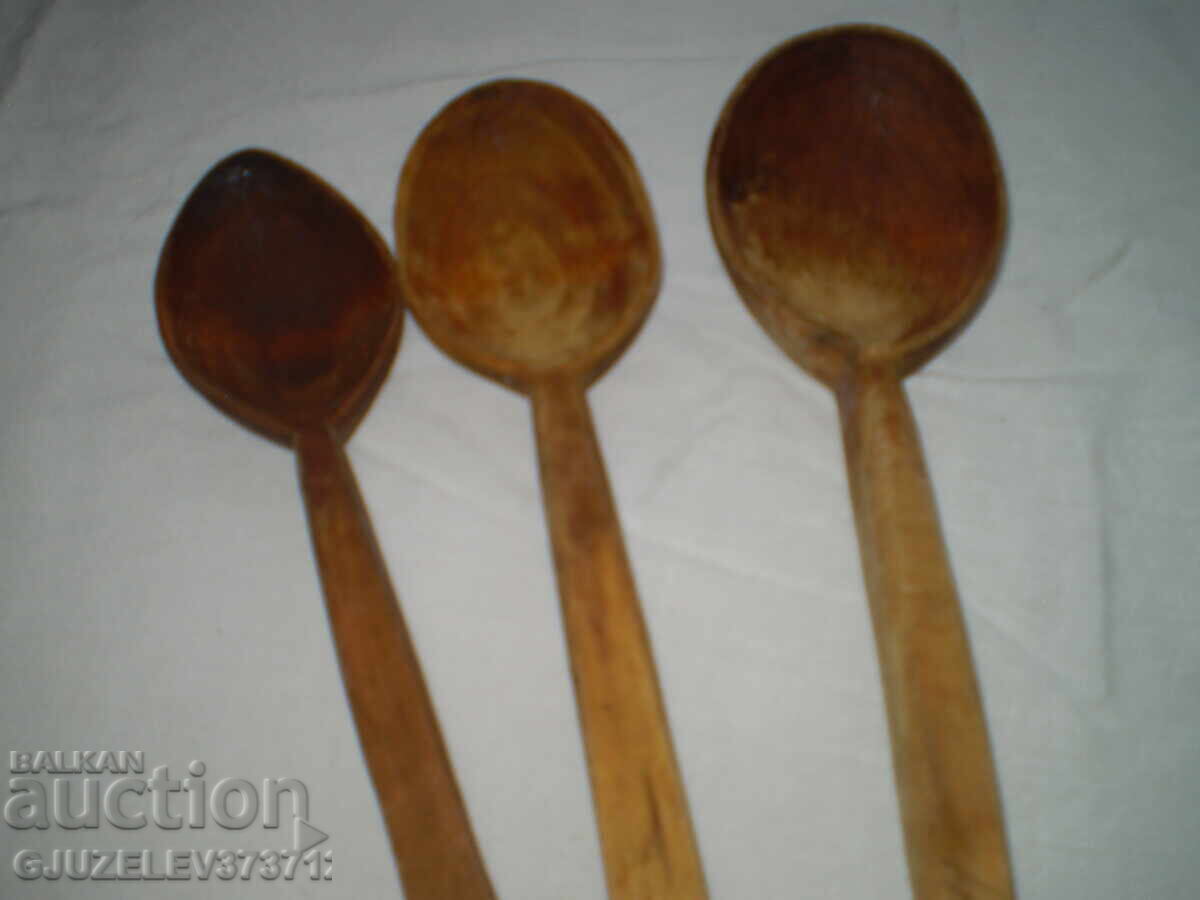 Delivery of Old handmade three wooden spoons Delivery of Old handmade three wooden spoons