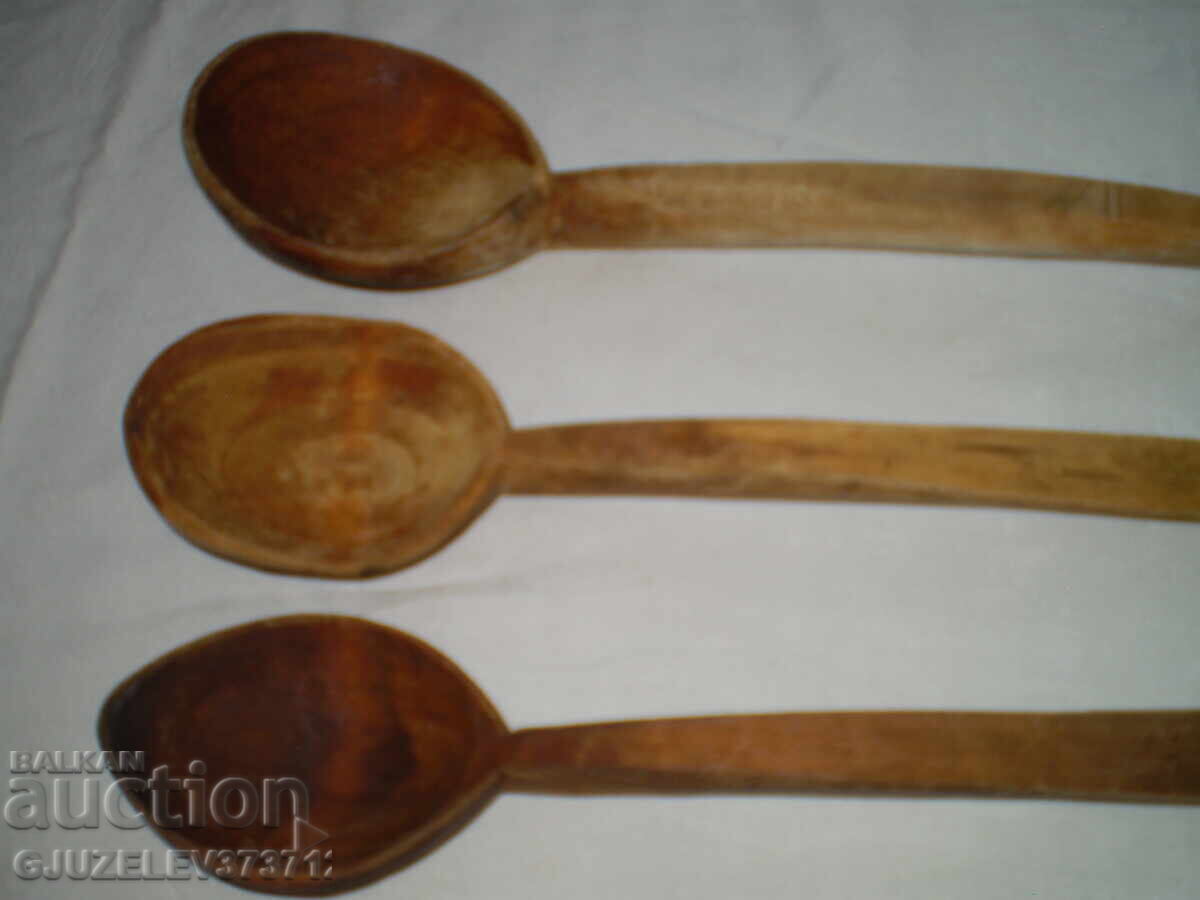 Old handmade three wooden spoons Old handmade three wooden spoons