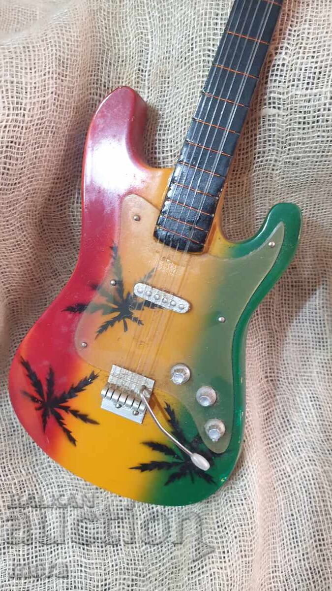Small souvenir guitar with price 35.00 BGN | € 17.90