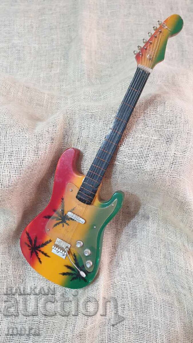 Small souvenir guitar