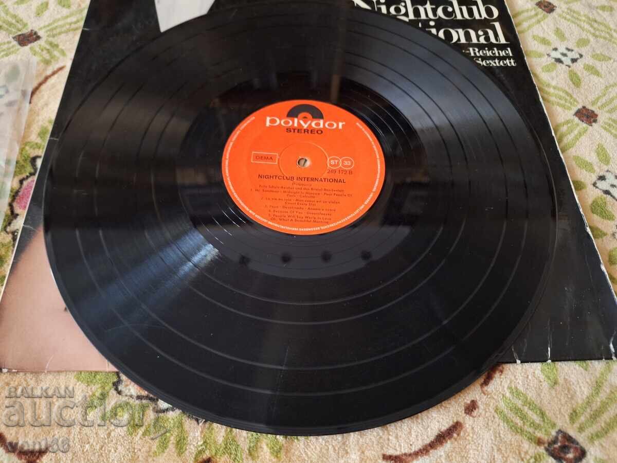 Disc de vinil - Nightclub internationale cu preț 3.50 BGN | € 1.79