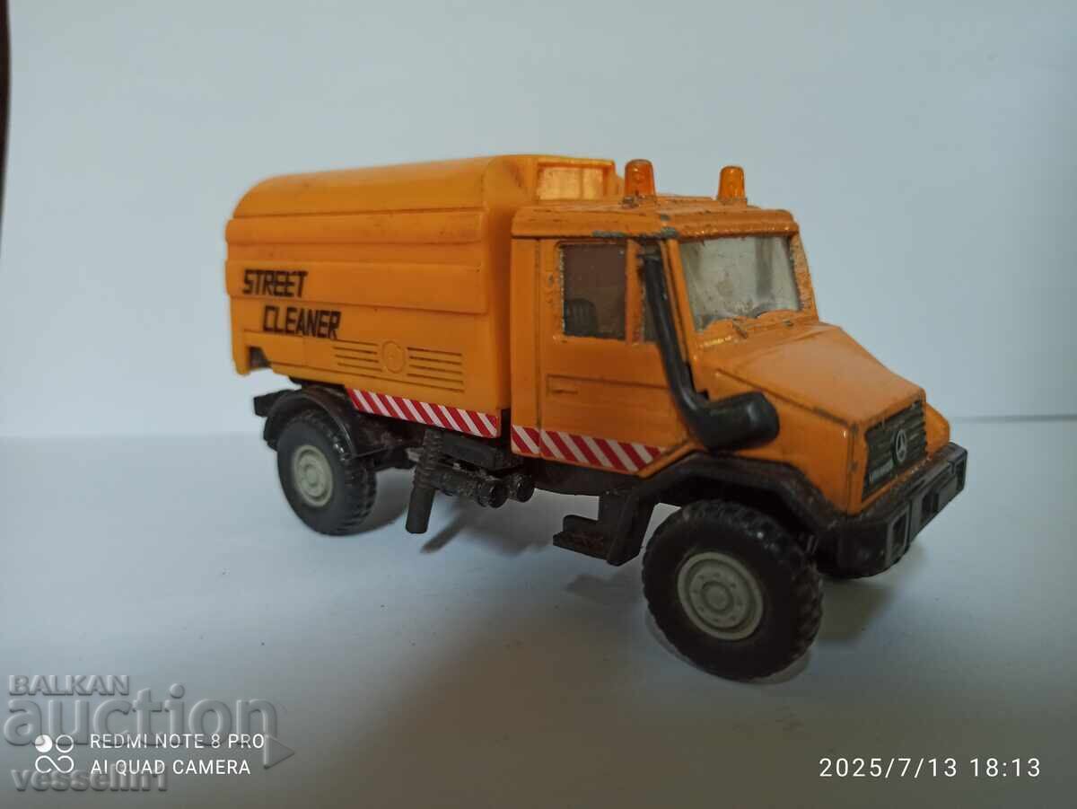 Old toy truck for cleaning, Mercedes Unimog