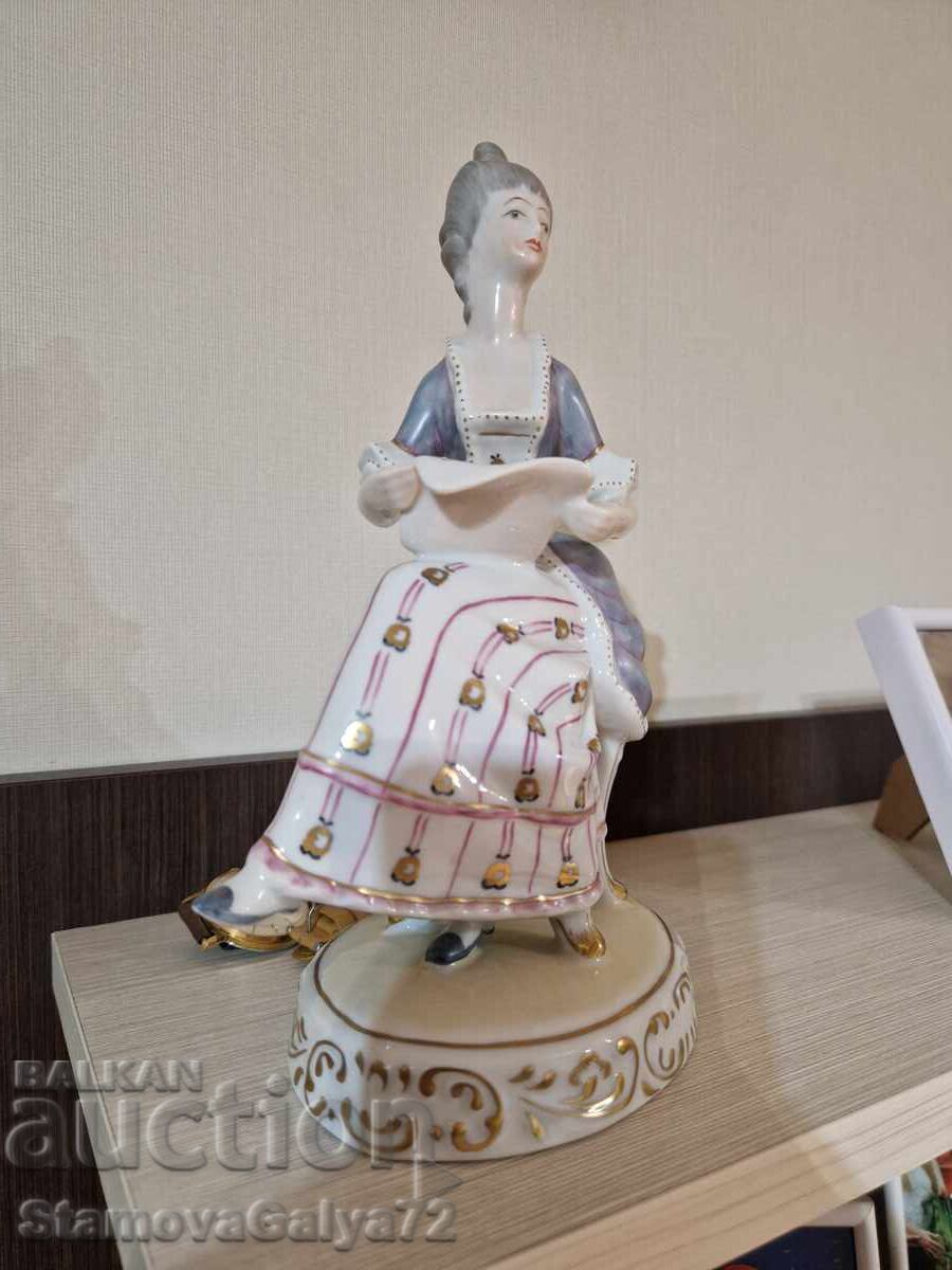 Delivery of Beautiful antique Hungarian porcelain figurine statue