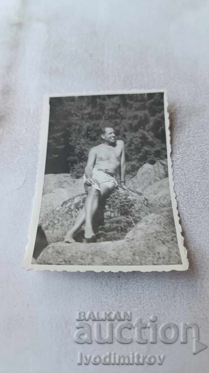 C-ka Ostrica Man with shorts on a rock in the mountains 1965