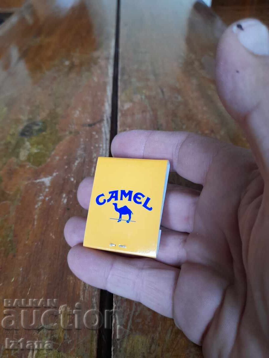 Chibrituri Camel cu preț 32.00 BGN | € 16.36 Chibrituri Camel cu preț 32.00 BGN | € 16.36