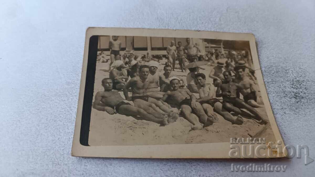 Photo of Men on the Beach Photo of Men on the Beach