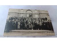 Photo Gabrovo Men women and children in front of an administrative building