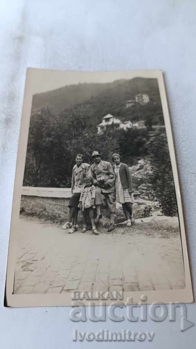 Photograph of Narechenski Bani, man, woman, and two girls, 1942