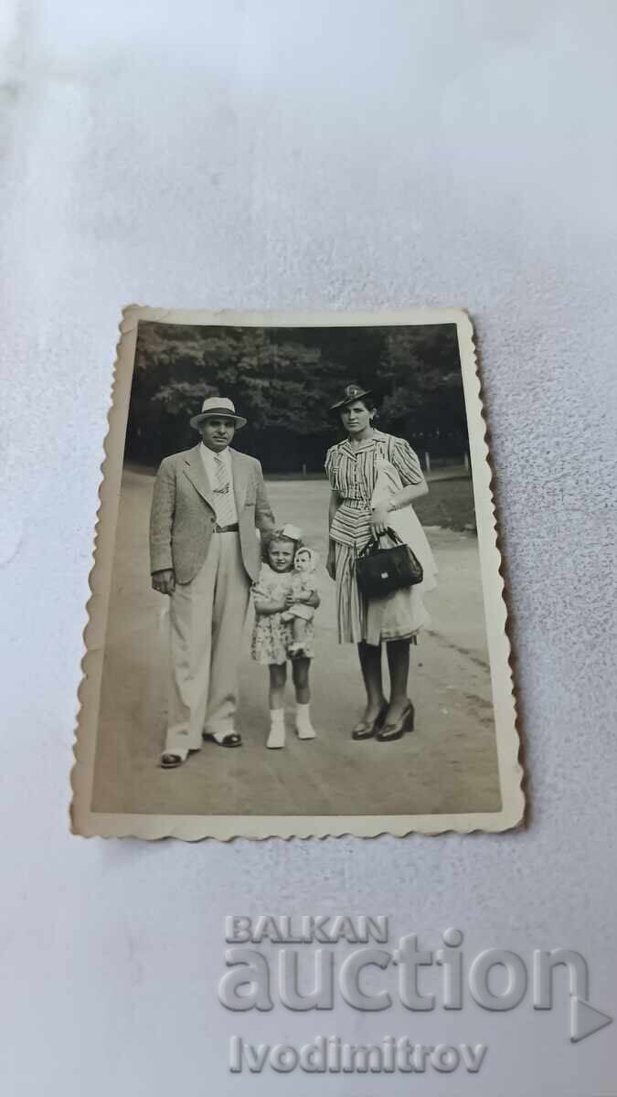 Photo of a Man, Woman and Little Girl on a Walk 1940