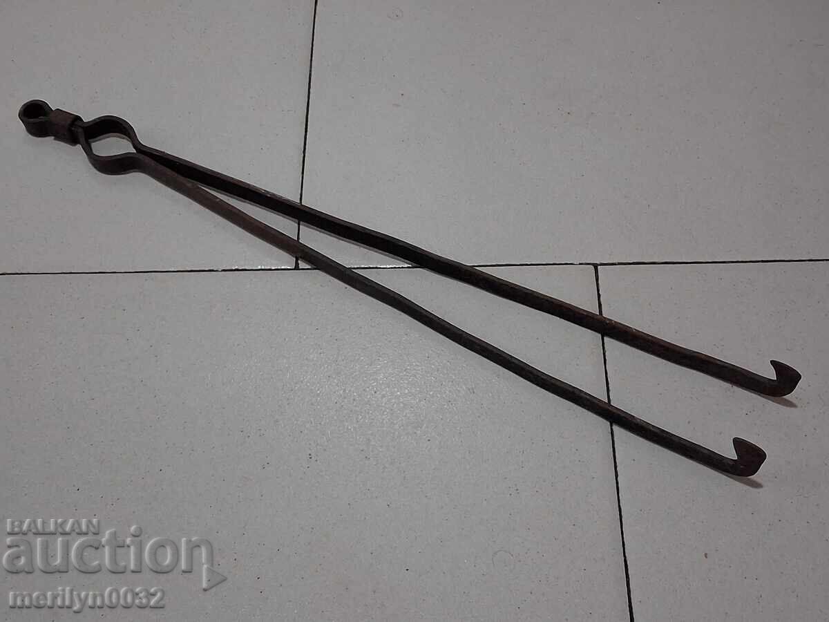 Old dilaf, tongs, wrought iron for oven
