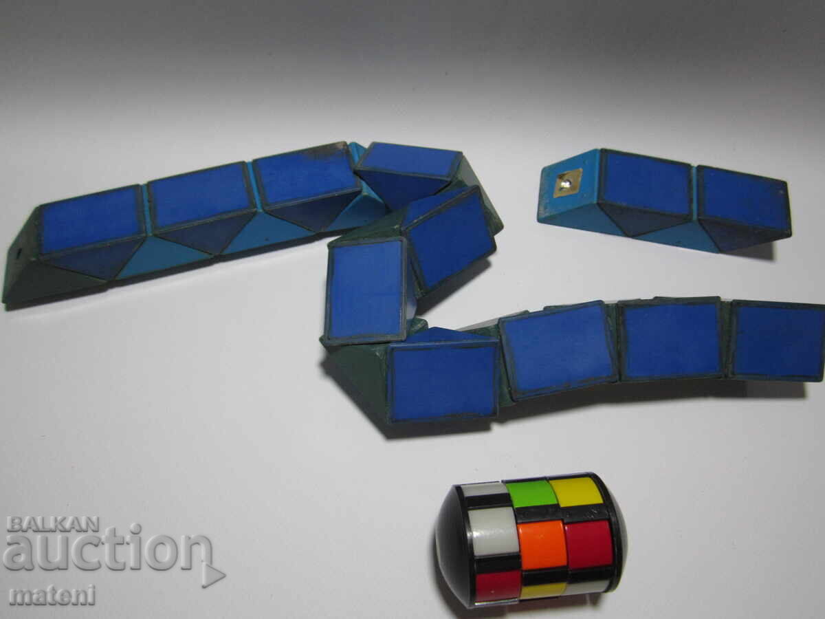 Delivery of OLD CHILDREN'S TOYS TYPE RUBIK'S CYLINDER SNAKE Delivery of OLD CHILDREN'S TOYS TYPE RUBIK'S CYLINDER SNAKE