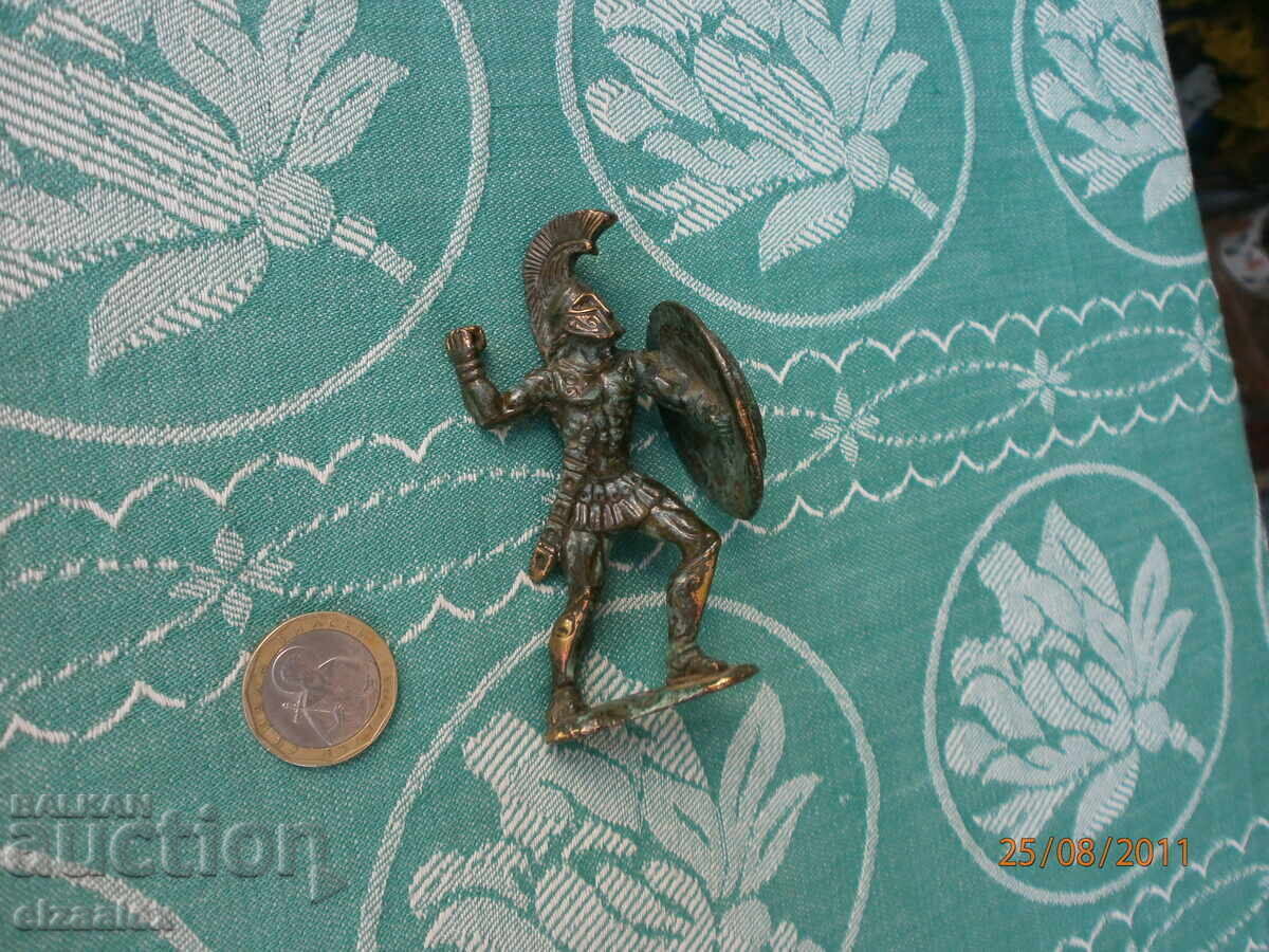 O figură masivă din bronz - 5