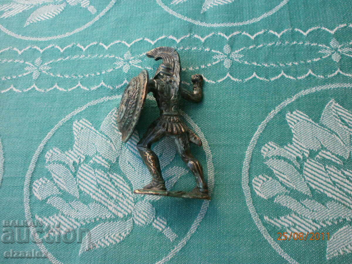 O figură masivă din bronz - 6