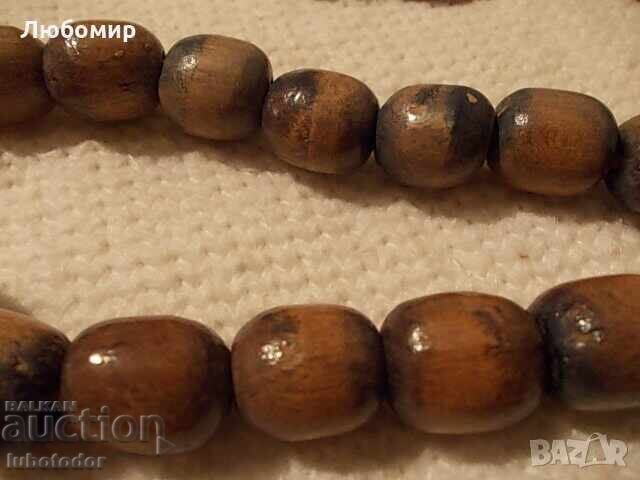 Old wooden rosary with price 12.00 BGN | € 6.14 Old wooden rosary with price 12.00 BGN | € 6.14