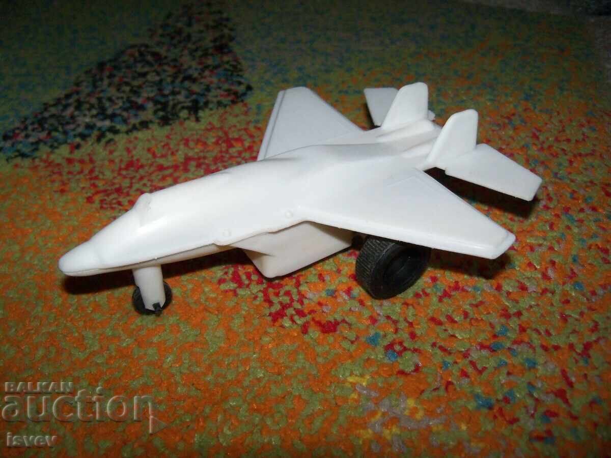 Toy airplane with an inertial engine, social toy Toy airplane with an inertial engine, social toy