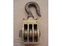 Old wrought pulley polyspast wrought iron pulley pulley