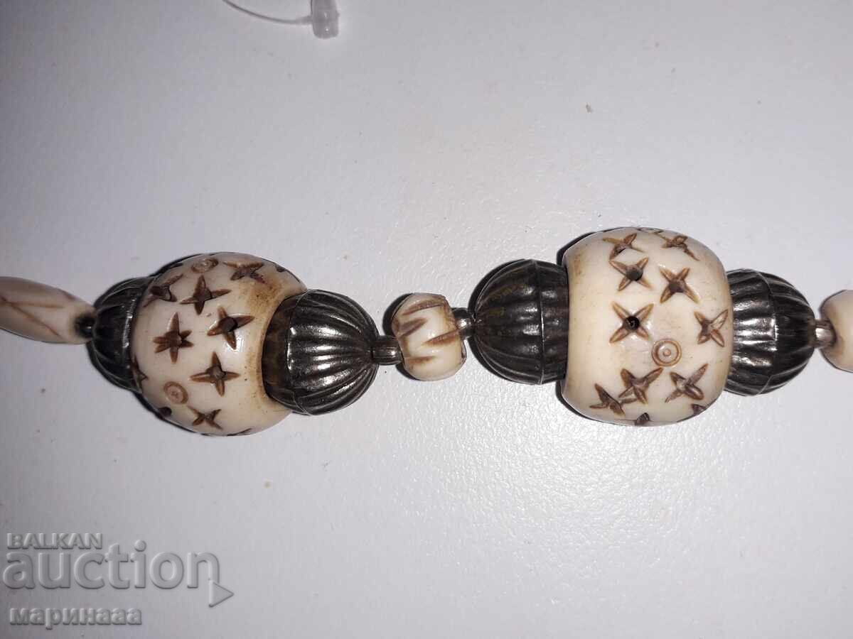 Licitație COLIER. OS, BRONZ ARGINTAT