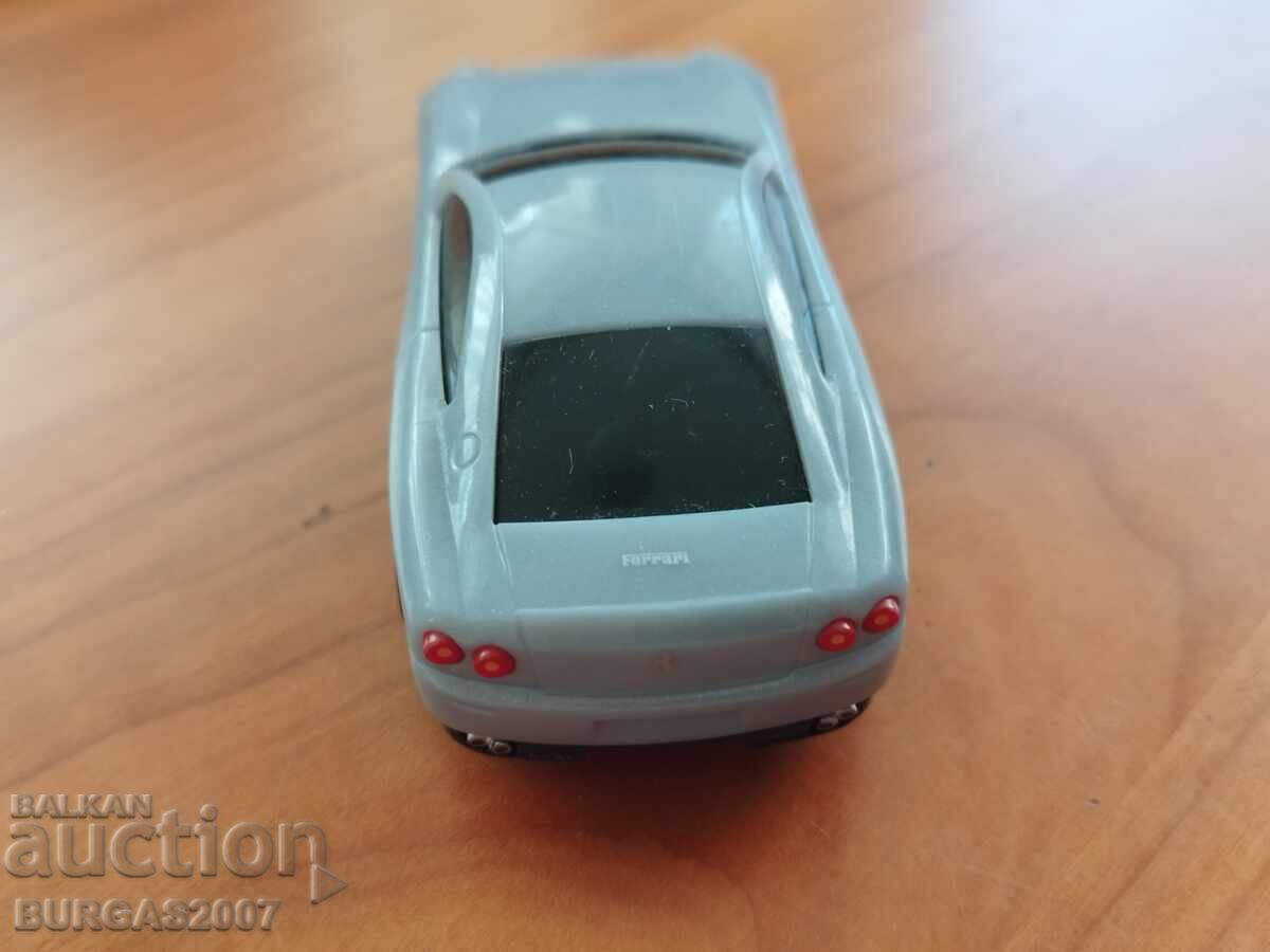 Delivery of Plastic stroller, Ferrari 612 Scaglietti Delivery of Plastic stroller, Ferrari 612 Scaglietti
